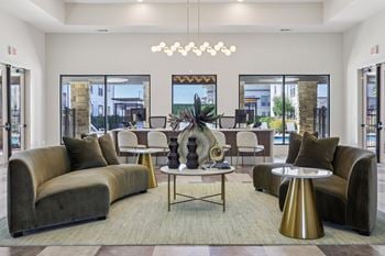 Living room with round gold table